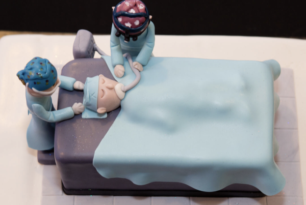 Cake decoration celebrating plastic surgery