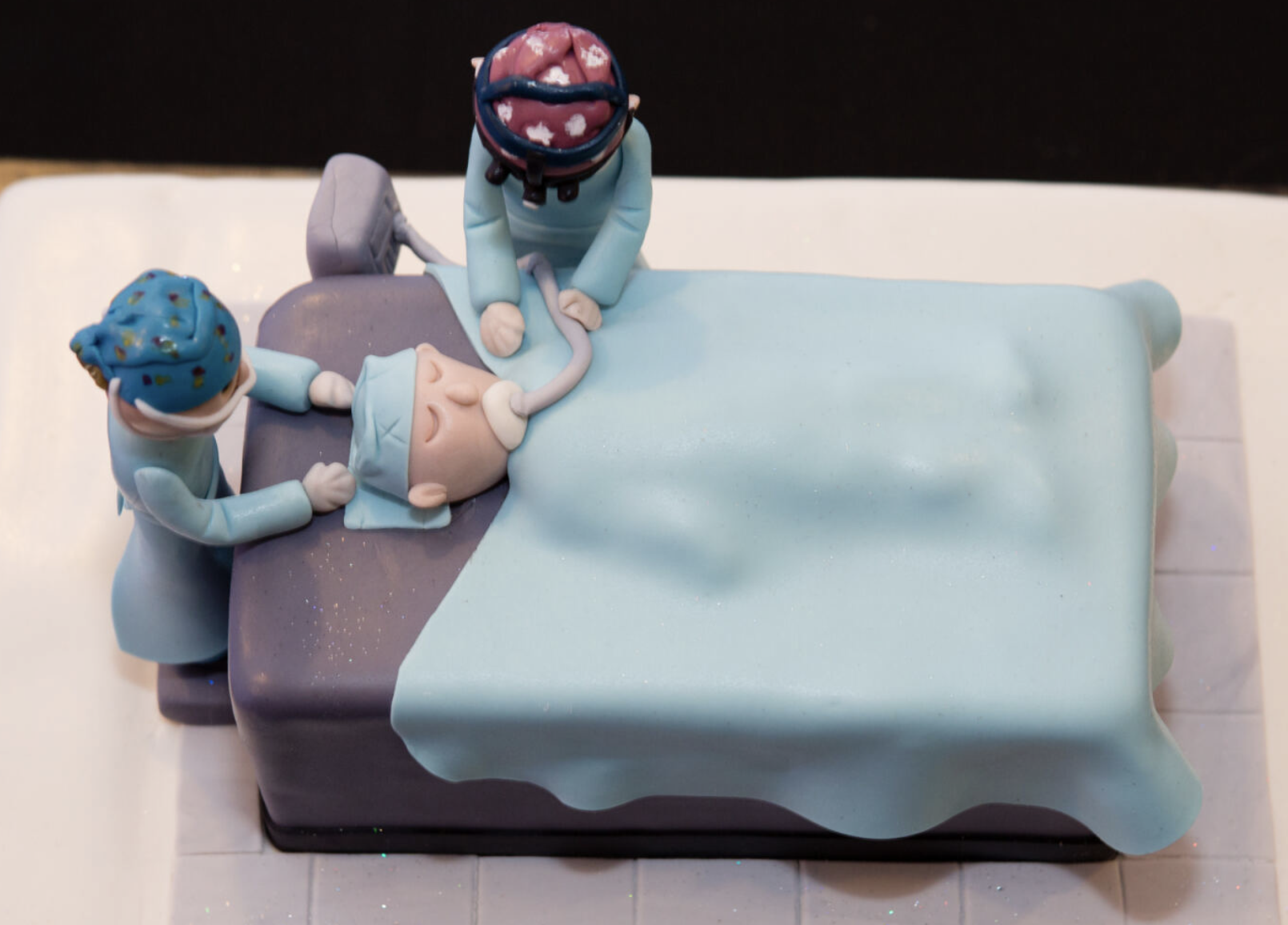 Cake decoration celebrating plastic surgery